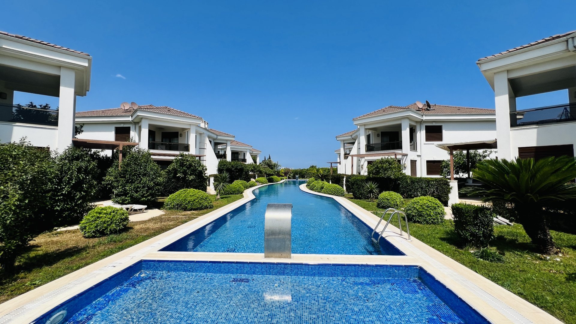 Belek vs Side and Kemer property market comparison covering buyer profiles, development density, and investment logic in Turkey